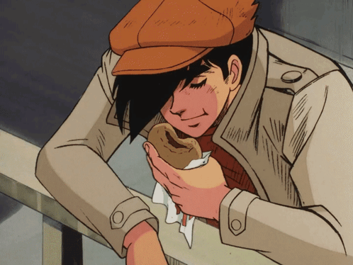 Man In Trench Coat Holding Sandwich GIF