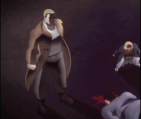 A Man In A Trench Coat Is Standing Next To A Man In A Suit GIF