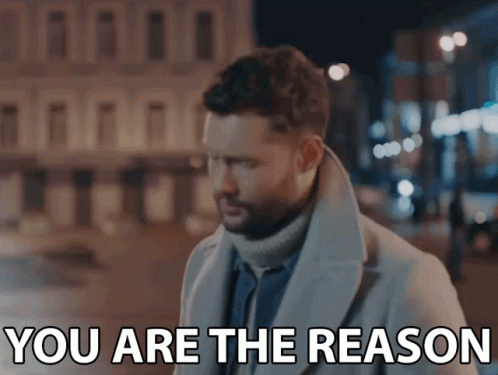 A Man In A Trench Coat Says You Are The Reason GIF