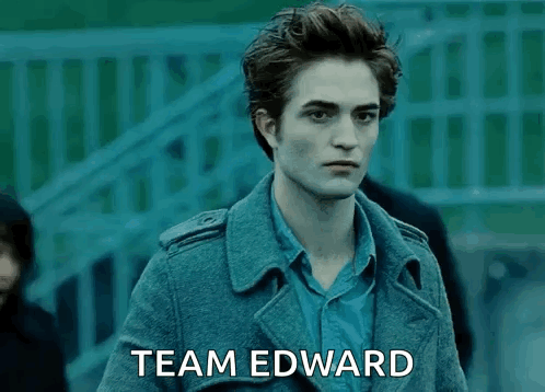 A Man In A Trench Coat With The Words Team Edward Written On The Bottom GIF