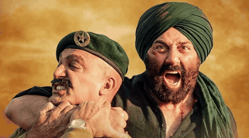 A Man In A Turban Is Holding Another Man In A Beret With A Star On It GIF