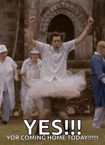 Man In Tutu Jumping In Air With Group Behind GIF