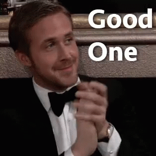 A Man In A Tuxedo And Bow Tie Is Clapping His Hands And Says `` Good One '' . GIF