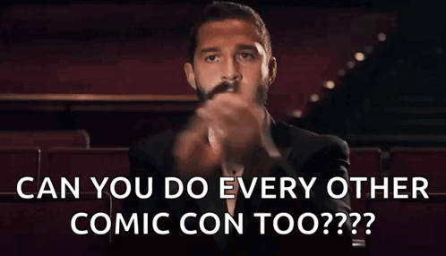 A Man In A Tuxedo And Bow Tie Is Sitting In A Theater And Asking Can You Do Every Other Comic Con Too . GIF