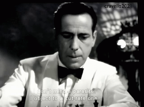 a man in a tuxedo and bow tie says " i do n't mind a parasite "