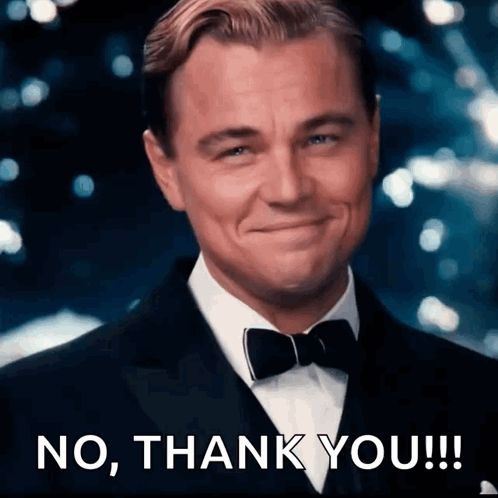 A Man In A Tuxedo And Bow Tie Says No Thank You !!! GIF