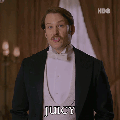 A Man In A Tuxedo Is Saying Juicy In Front Of A Hbo Logo GIF
