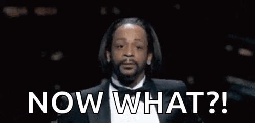A Man In A Tuxedo Is Saying `` Now What '' . GIF