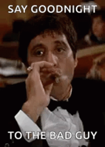 Man In Tuxedo Smoking Cigar GIF