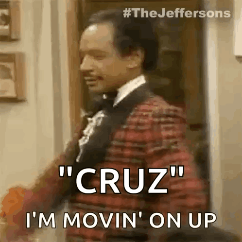 A Man In A Tuxedo Is Standing In A Doorway And Saying `` Cruz '' I 'M Movin ' On Up GIF