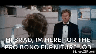 A Man In A Tuxedo Is Talking To A Woman In An Office And Asking Her For A Furniture Job . GIF