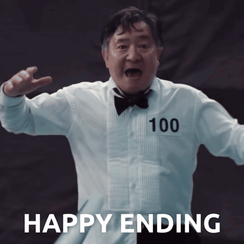 A Man In A Tuxedo With The Number 100 On His Chest GIF