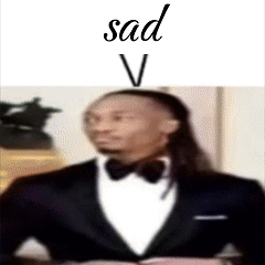 A Man In A Tuxedo With The Word Sad On Top Of Him GIF