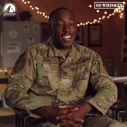 A Man In A U.s. Army Uniform Is Sitting In A Chair And Says Follow 68 Whiskey GIF