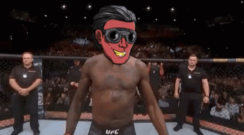 A Man In A Ufc Ring With A Red Face GIF