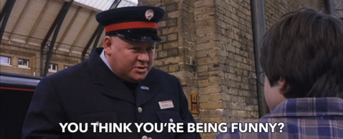 a man in a uniform asks a boy if he thinks he 's funny