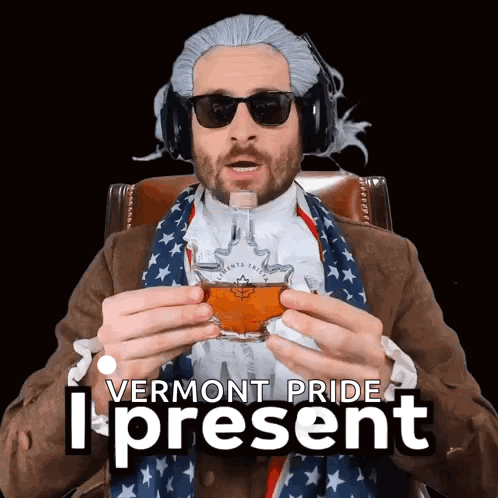 A Man In A Vermont Pride Costume Is Holding A Glass GIF
