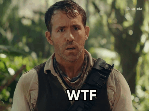 A Man In A Vest With The Word Wtf Written On His Chest GIF