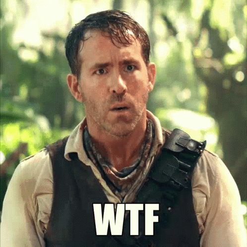 A Man In A Vest With The Word Wtf Written On His Chest GIF