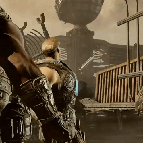 A Man In A Video Game Is Wearing A Glove That Says ' Armour ' On It GIF