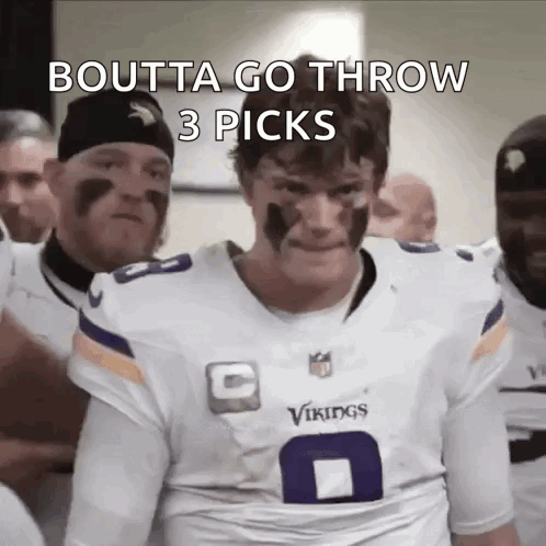 A Man In A Vikings Jersey Says Boutta Go Throw 3 Picks On His Face GIF