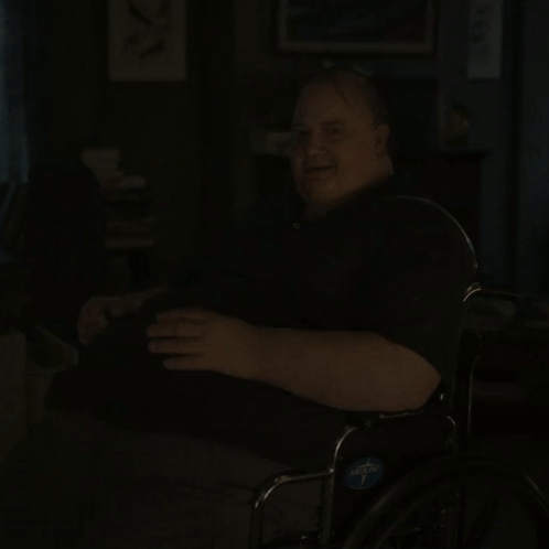 A Man In A Wheelchair Has A Sticker On The Back Of His Chair That Says ' Adaptive ' GIF