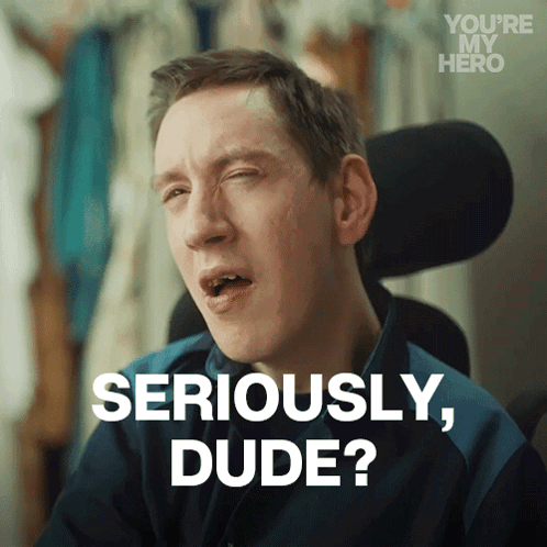 A Man In A Wheelchair Is Making A Funny Face And Says Seriously Dude GIF