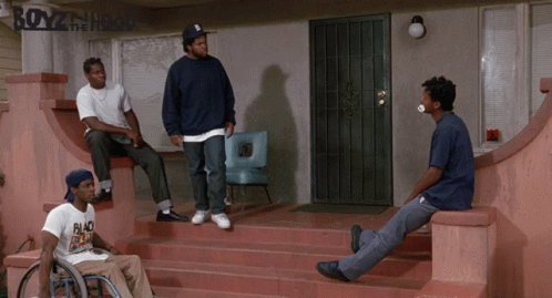 A Man In A Wheelchair Sits On The Steps Of A Boyz In The Hood House GIF