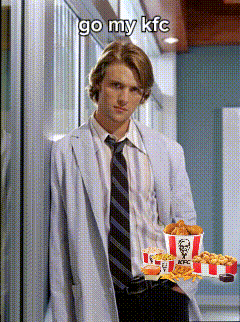 A Man In A White Coat And Tie Is Holding A Tray Of Kfc Fried Chicken GIF