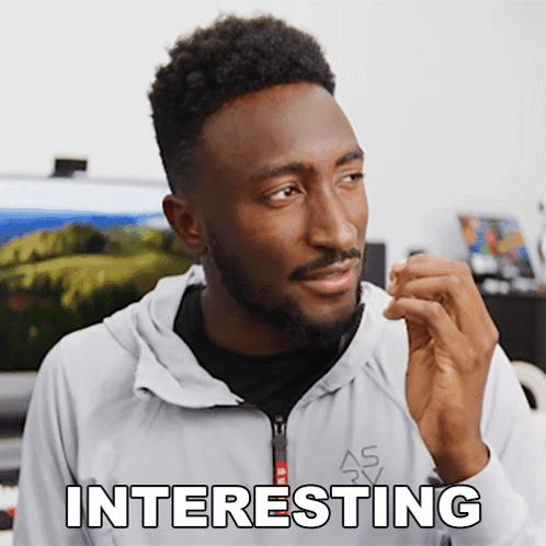 A Man In A White Jacket Says Interesting In White Letters GIF