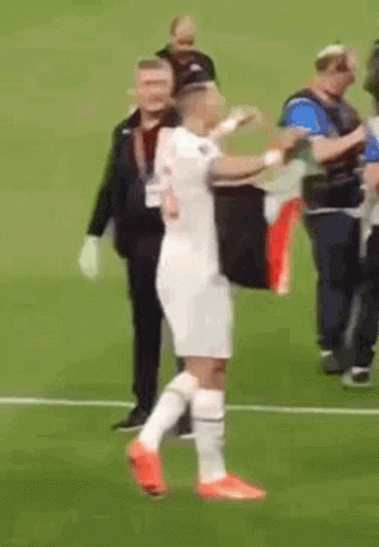 A Man In A White Jersey With The Number 5 On It GIF