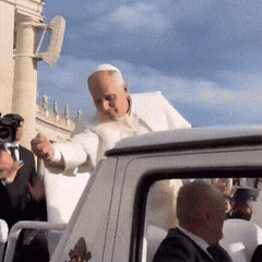 A Man In A White Robe Is Standing In The Back Of A Car GIF
