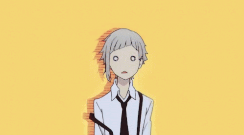 A Man In A White Shirt And Black Tie Is Making A Funny Face . GIF