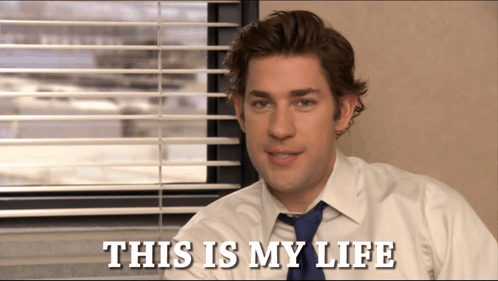 A Man In A White Shirt And Blue Tie Says " This Is My Life " In Front Of A Window GIF