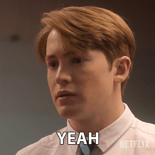 A Man In A White Shirt And Blue Tie Says Yeah GIF