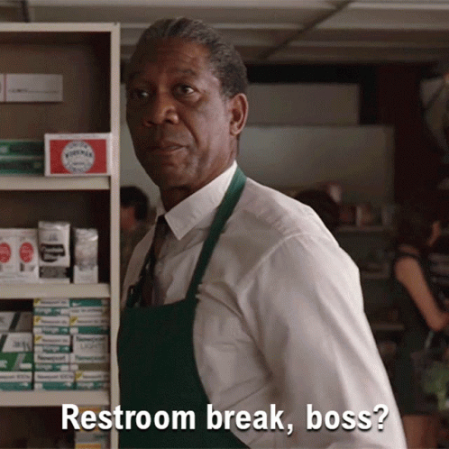 A Man In A White Shirt And Green Apron Says " Restroom Break Boss " GIF