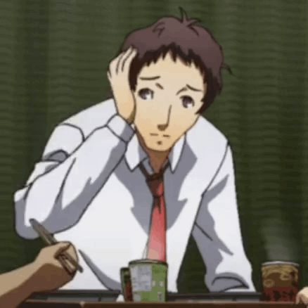 A Man In A White Shirt And Red Tie Sitting At A Table GIF