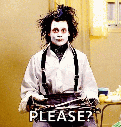 A Man In A White Shirt And Suspenders Is Holding A Pair Of Scissors And Saying Please . GIF