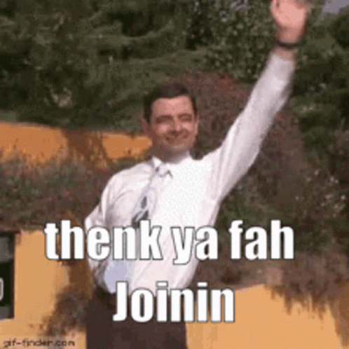 A Man In A White Shirt And Tie Is Raising His Arm In The Air And Says Thank Ya Fah Joinin . GIF