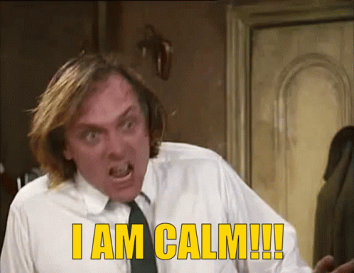 A Man In A White Shirt And Tie Is Saying I Am Calm GIF