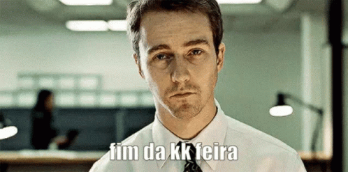 A Man In A White Shirt And Tie Says " Fim Da Kk Feira " In A Foreign Language GIF