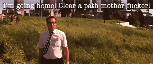 A Man In A White Shirt And Tie Stands In A Field With The Words I 'M Going Home Clear A Path Mother Fucker GIF