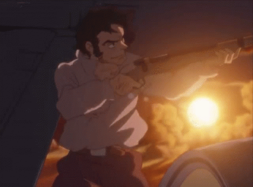 A Man In A White Shirt Is Holding A Gun In His Right Hand GIF
