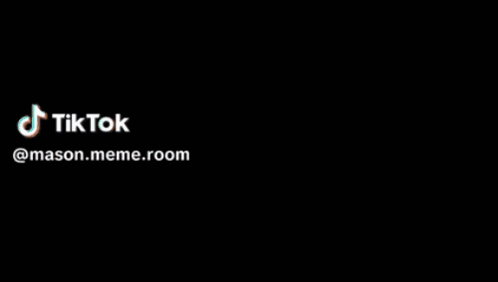 A Man In A White Shirt Is Holding A Light And A Tiktok Logo Is Visible GIF