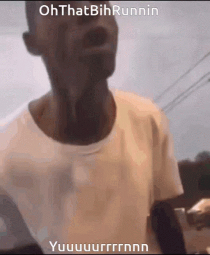 A Man In A White Shirt Is Making A Funny Face With The Words Oh That Bih Runnin Written On It GIF