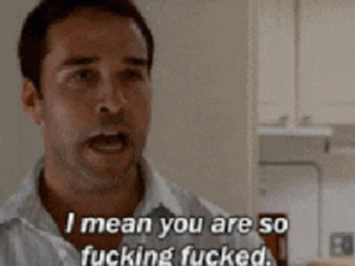 A Man In A White Shirt Is Saying " I Mean You Are So Fucking Fucked " GIF
