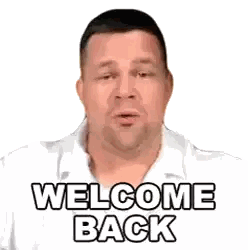 a man in a white shirt is saying " welcome back "