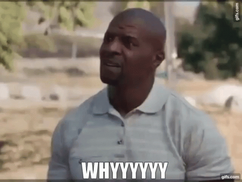 A Man In A White Shirt Is Saying Why . GIF