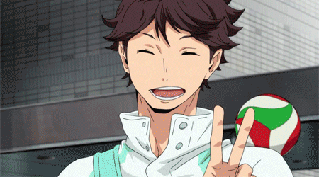 A Man In A White Shirt Is Smiling And Giving A Peace Sign GIF