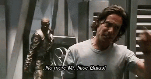 Man In White Shirt Talking To Another Man GIF